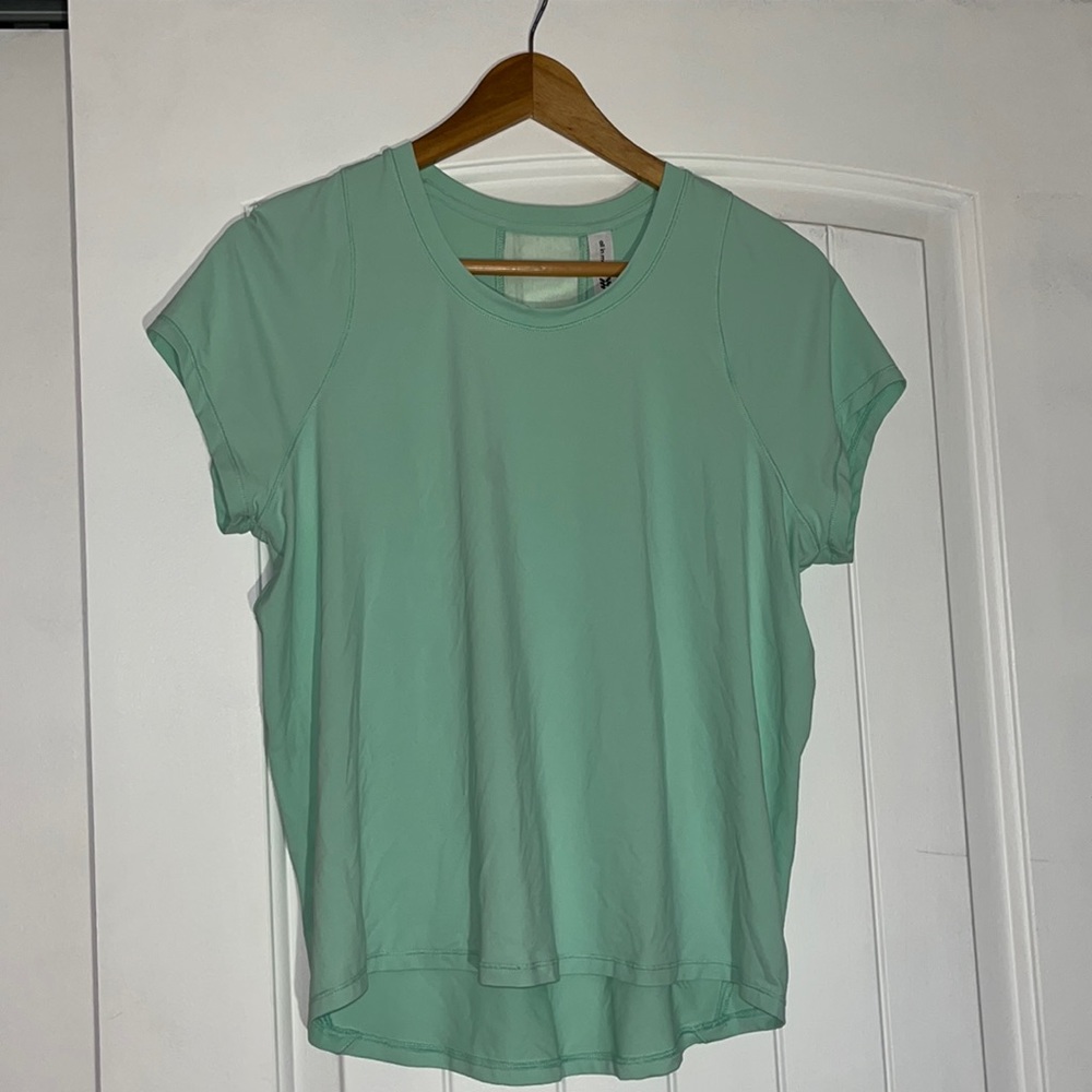 Size S could fit M as well, turquoise athletic shirt, ALL IN MOTION brand.
